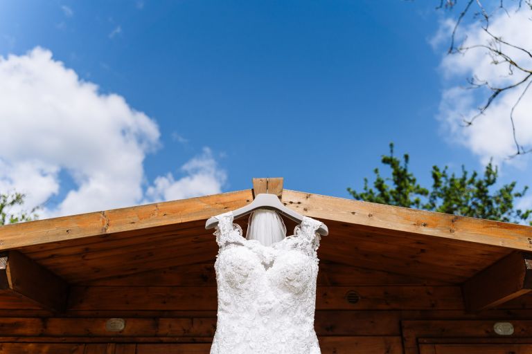 A wedding dress hanging in Warwickshire